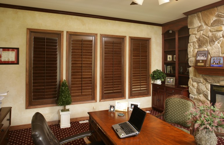 Wooden plantation shutters in a Boston home office